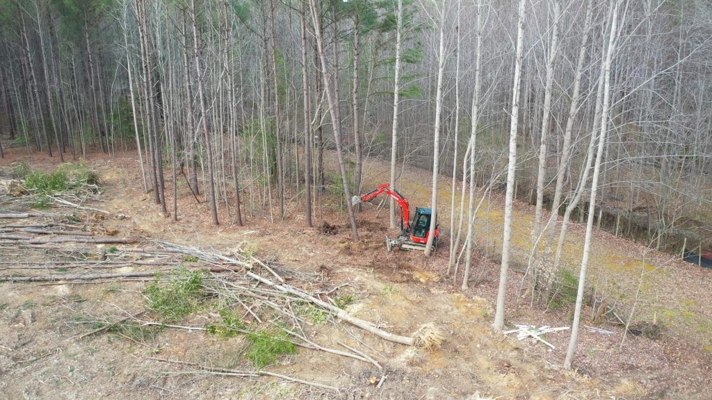 Tree Clearing by Truck for Builder to begin New Home Build