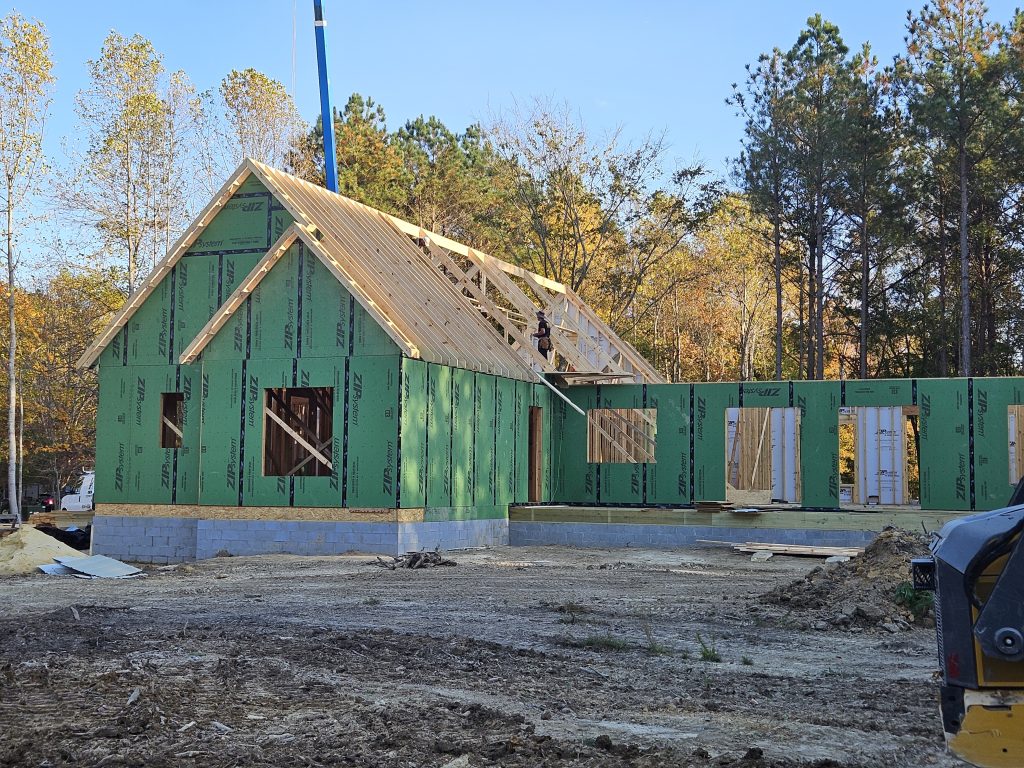 Builder shows Roof after Framing of New Home Build