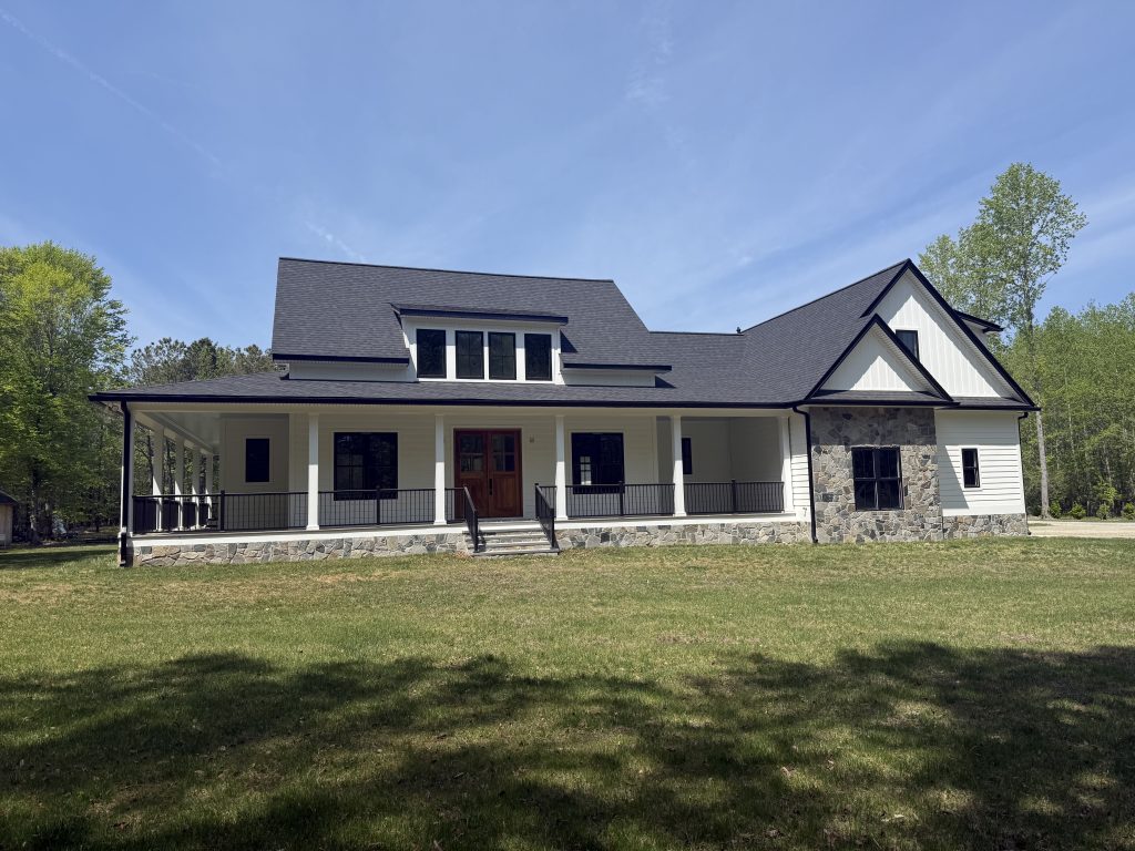 Custom Home Builder with Front Railings completed