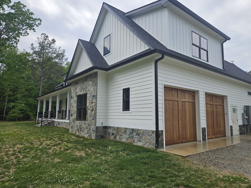 Custom Home Builder with New Garage Doors completed