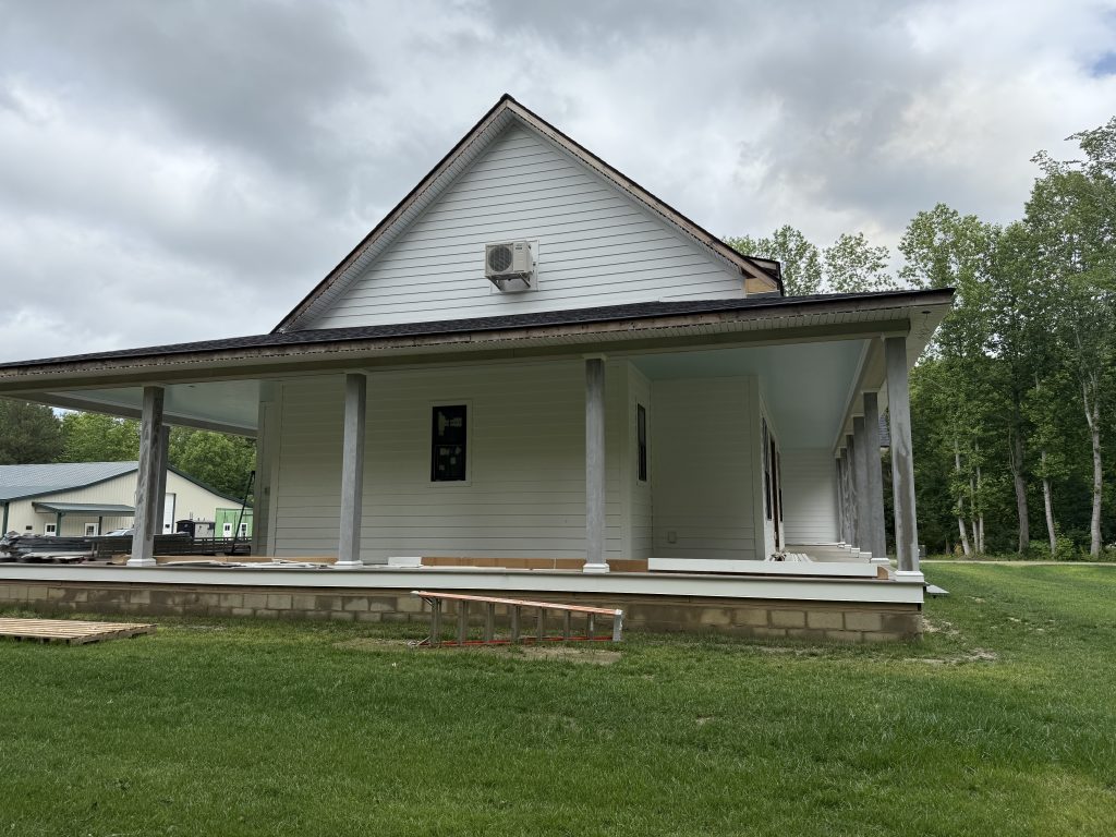 Home Builder shows Siding in Progress from left side