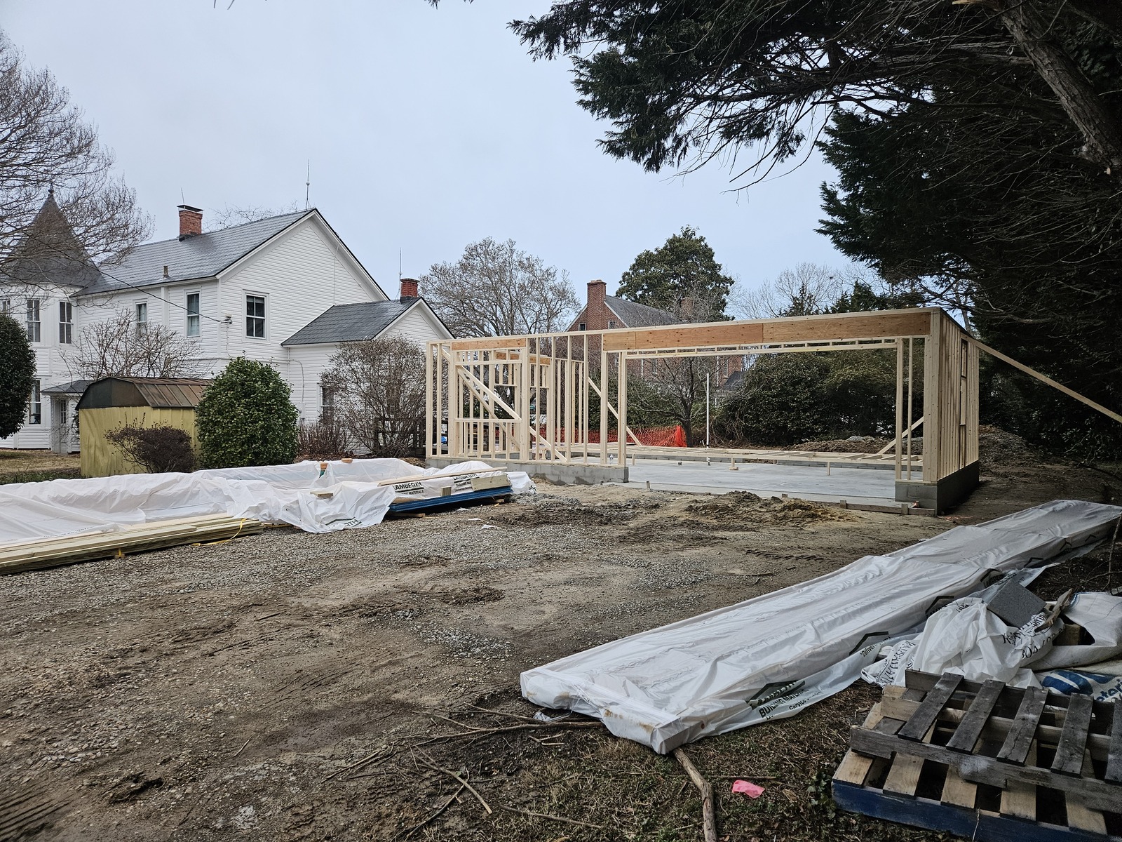 Framing of 2-car garage with small shop