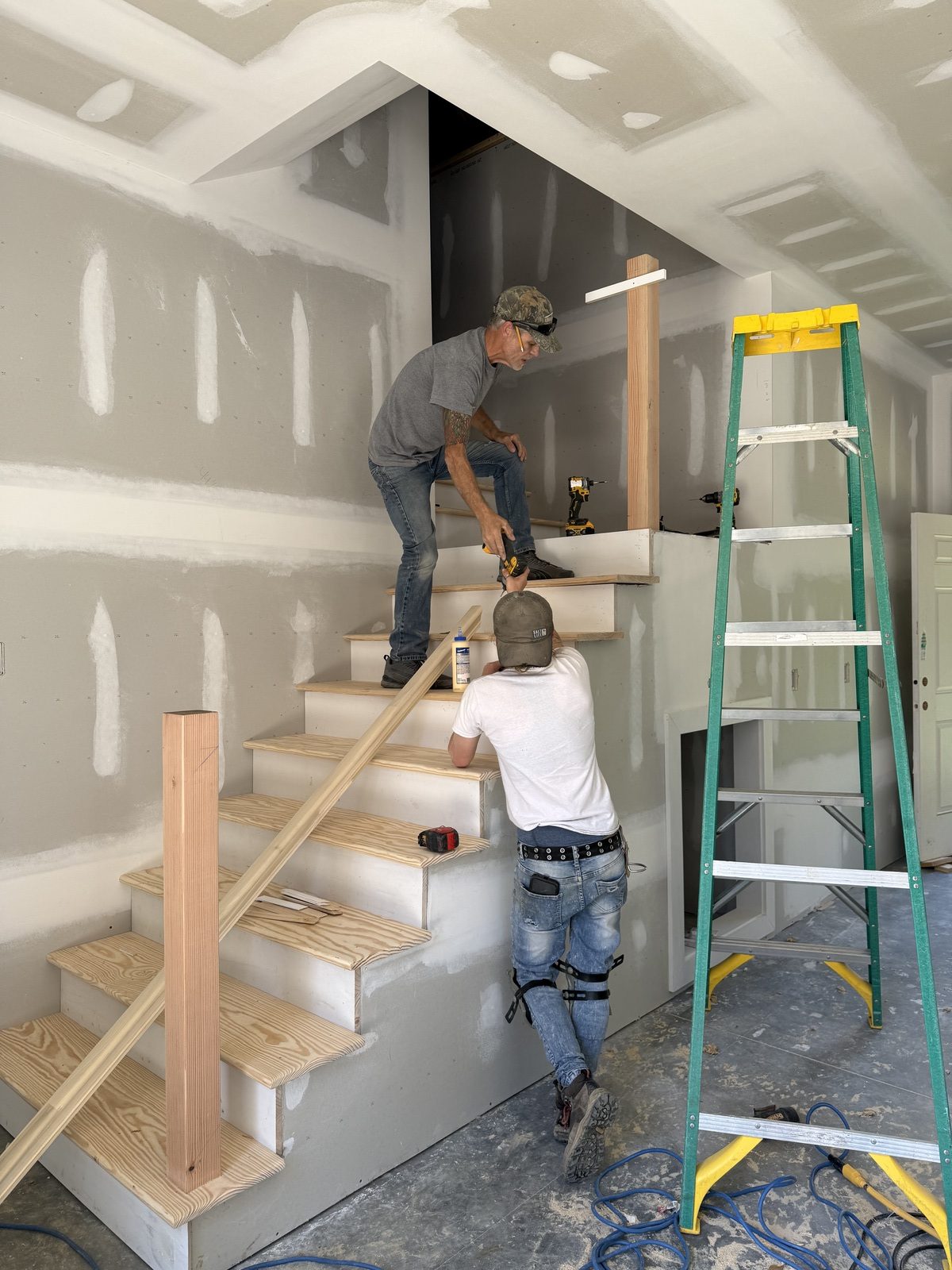 Installation of stair rails on open stairway