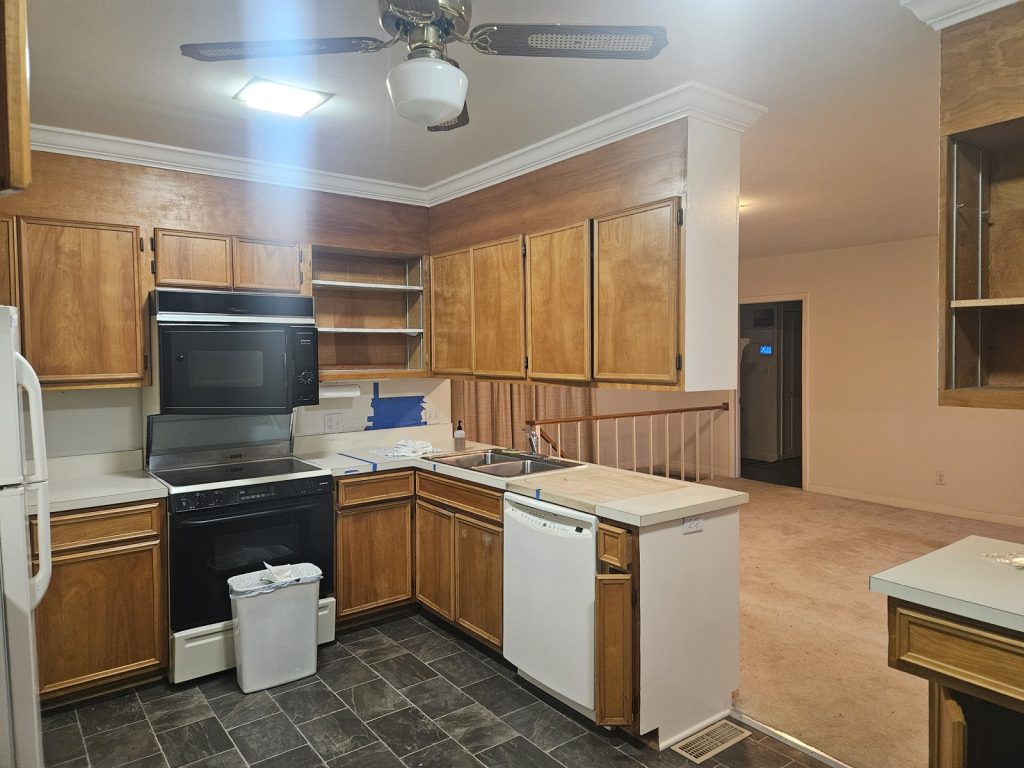 Before Kitchen Remodeler with cabinets blocking room from inside