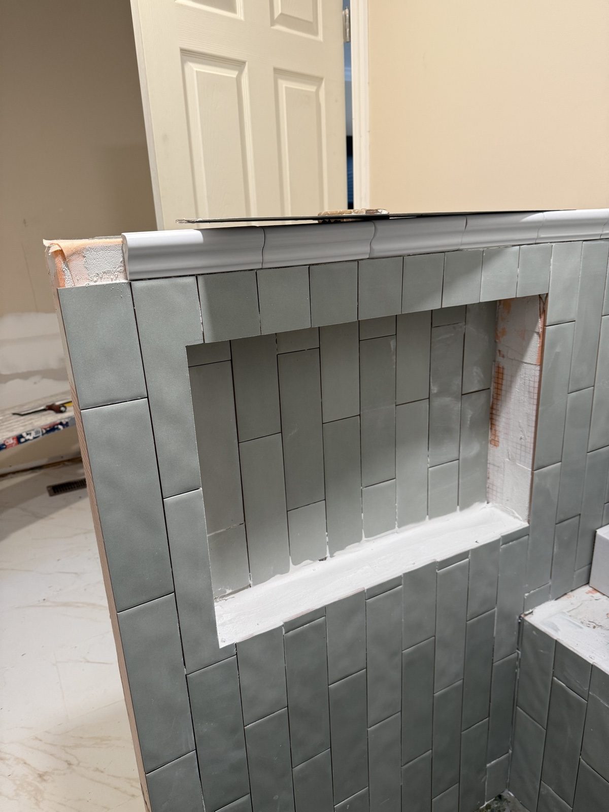Creating a new shower niche during the bathroom remodel