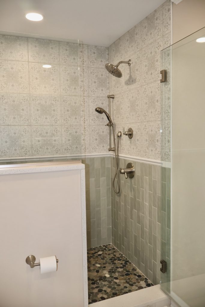 Master Bathroom Remodel with new shower layout and diverse materials